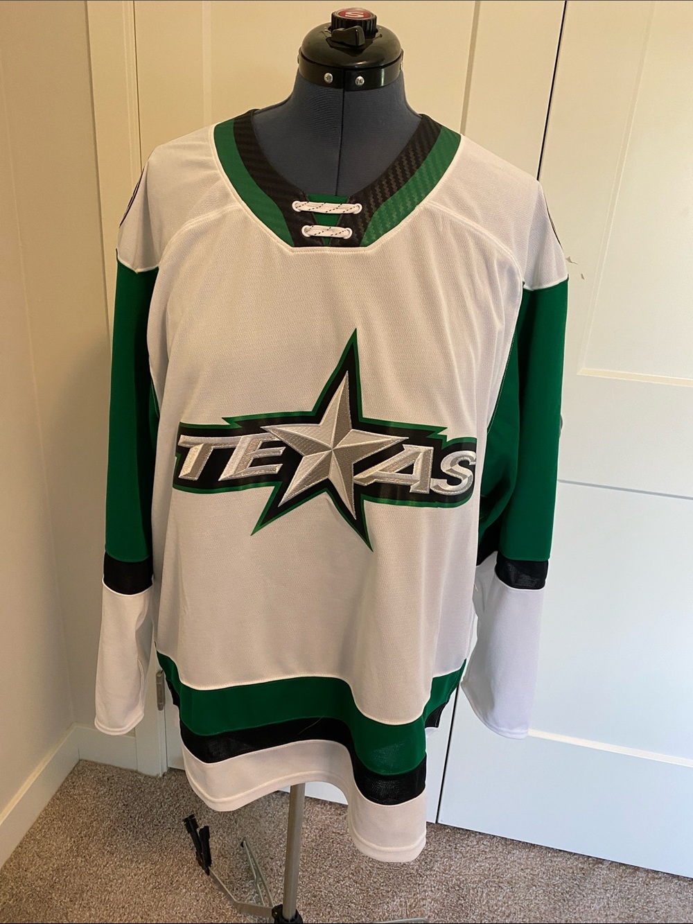 CCM White and Green Stars Hockey Jersey Collar Detail